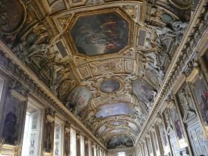 Image of one of the hallways in the Louvre.