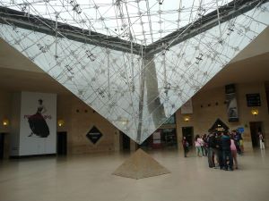Image of two pyramids at the underground entrance to the Louvre.